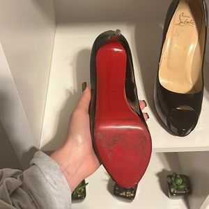 Black Christian Louboutin 120mm stiletto heels.